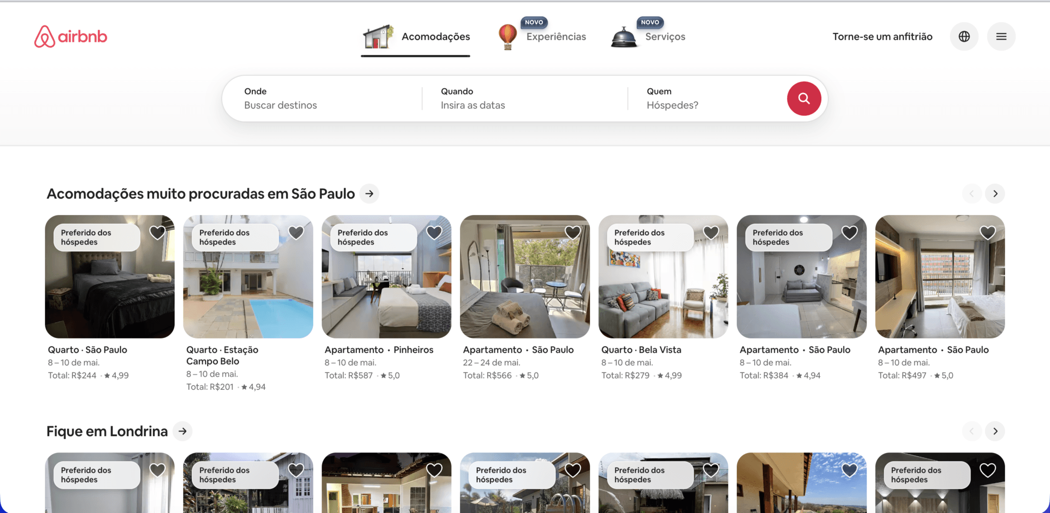 Interface de marketplace de viagens com cards de hospedagem, busca e estilo visual inspirado no Airbnb